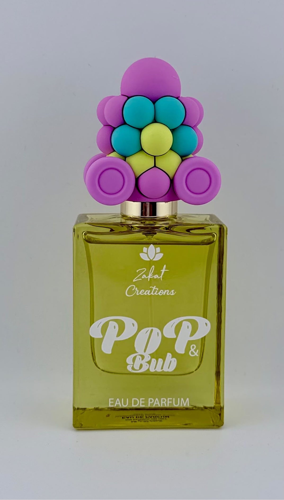 Perfume Pop & Bub de Zakat Creations, Eau de Parfum 50 ml, frasco amarillo verdoso con tapón de burbujas de colores – Siblingsgo Miami