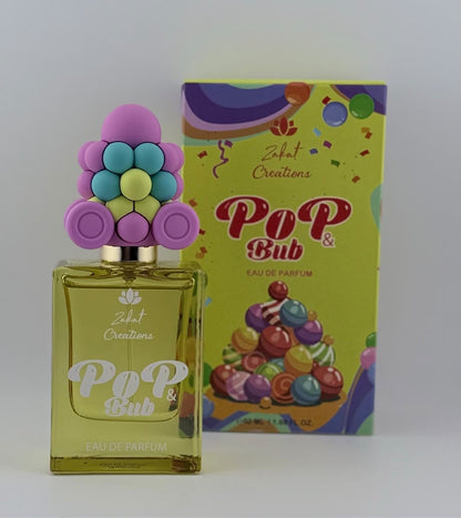 Perfume Pop & Bub de Zakat Creations, Eau de Parfum 50 ml, frasco amarillo verdoso junto a su caja de regalo – Siblingsgo Miami
