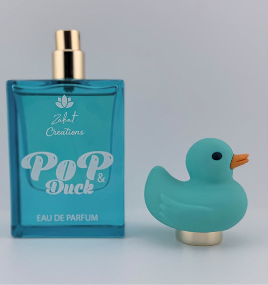 Perfume Pop & Duck de Zakat Creations, Eau de Parfum 50 ml, frasco azul junto a su caja de regalo – Siblingsgo Miami